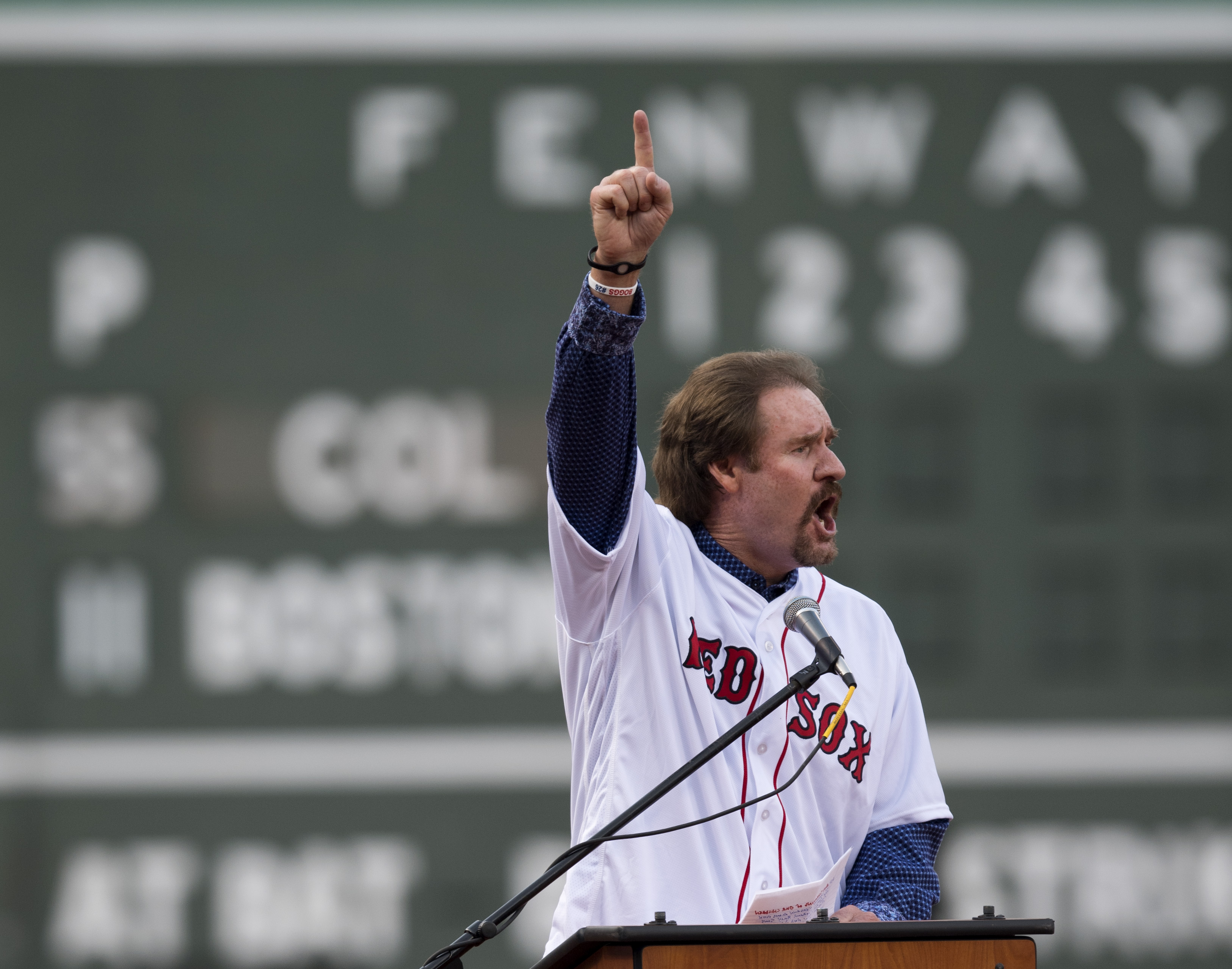 BOSTON, MA - MAY 26: Former Boston Red Sox third baseman Wade Boggs addresses the crowd during a ceremony to retire his number 26 on May 26, 2016 at Fenway Park in Boston, Massachusetts. Boggs played 11 seasons and collected 2,098 hits as a member of the Red Sox. (Photo by Michael Ivins/Boston Red Sox/Getty Images) *** Local Caption *** Wade Boggs